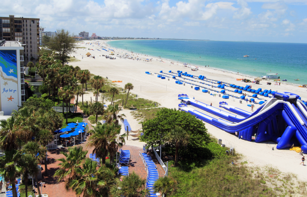 A1: Good old fashioned time on the beach – fully unplugged, of course! @TWResorts is a fave. #FLTravelChat