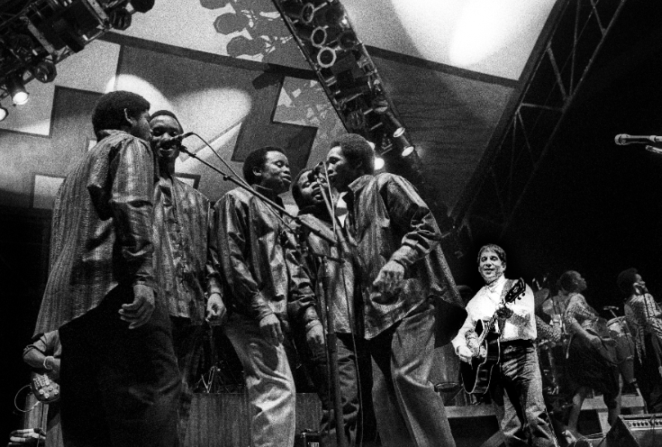 RollingStone's tweet photo. “An enormous cultural treasure. A cultural gold mine.” In 1987, Paul Simon spoke to us about ‘Graceland’ and the enormous influence and talent of Ladysmith Black Mambazo founder Joseph Shabalala, who died on Monday https://t.co/RDUbeJpoZx https://t.co/mijIB2lvYs