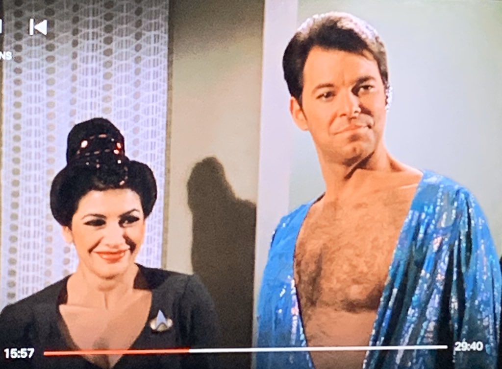 trek update: a matriarchal planet made riker wear this spangly satin number with one tit out and troi and yar are making fun of him