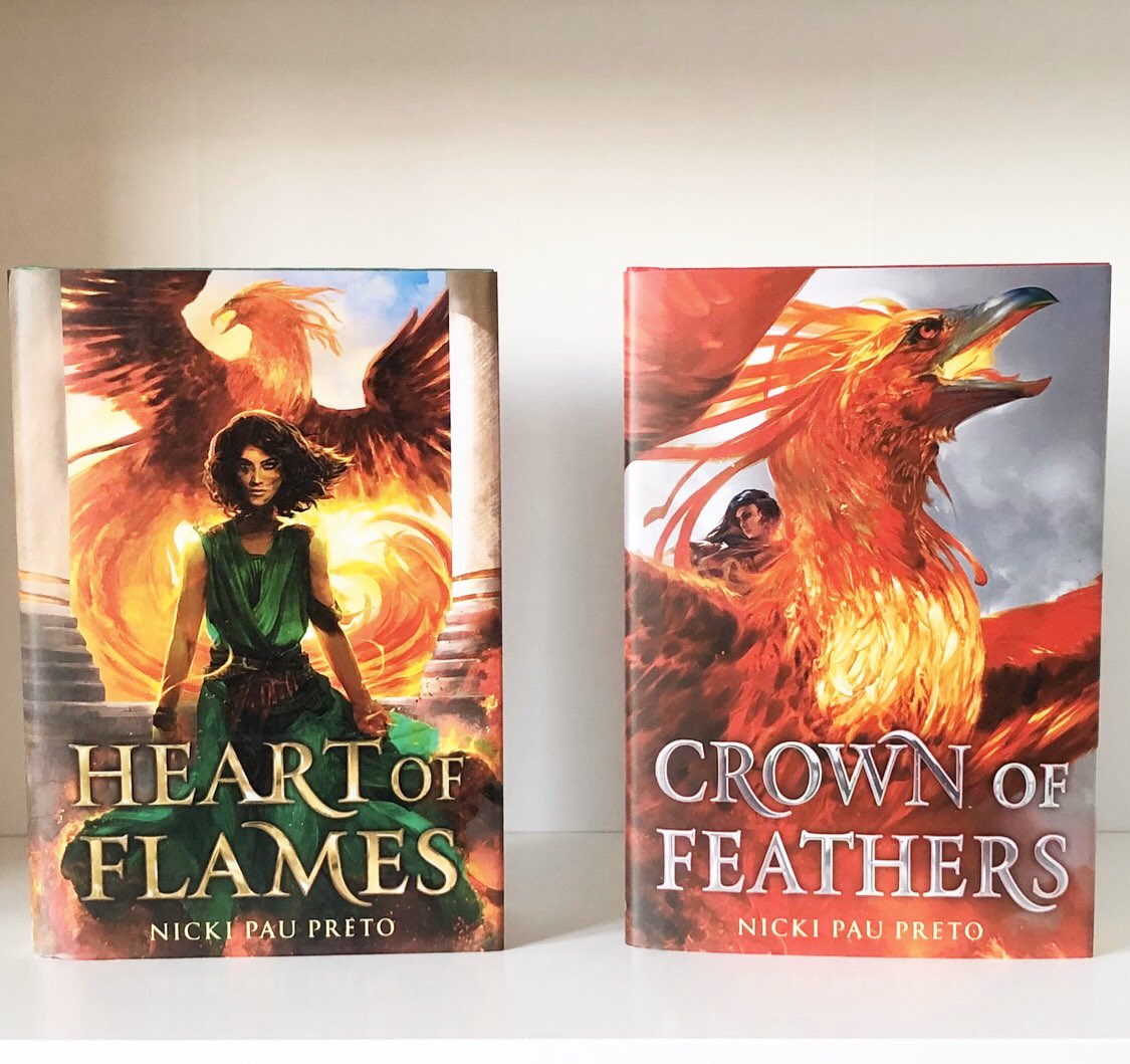 idealpages's tweet photo. After almost a year, the stunning #CrownOfFeathers no longer sits alone! The sequel, #HeartOfFlames, is out now! Pop into your local bookstore or pull up your fave virtual bookshop, and get your fiery copy now!
❤️🔥❤️🔥❤️🔥❤️
#HOFBookLaunch @first_riders @nickipaupreto https://t.co/etS87uwF9H