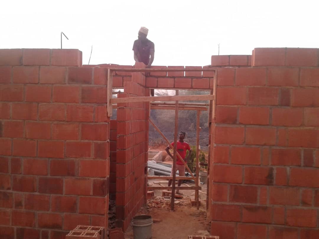 GrowEdoAgri's tweet photo. The hostel is coming on at pace  it's really taking shape -as we build our #agripreneur community. This is so positive offering hope for our #youth - #llLifeBeforeDeath #endslavery @FrEvaristus @Dr_RJByrne @SallyAxworthy @DFIDNigeria @RC_Southwark @HCThompson001 @DarrenWelchDFID https://t.co/Y5KKWe67CT