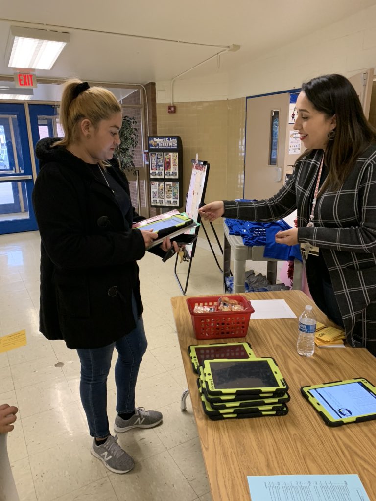 ASotoRamz44's tweet photo. Students sharing their work, progress and goals with their parents and family during student led conferences! PEL, Maribel, helping parents complete surveys to give us  feedback on improving services for parents/ families @EPISDLeeLions @ELPASO_ISD #iamepisd https://t.co/4qjjZwQoXw