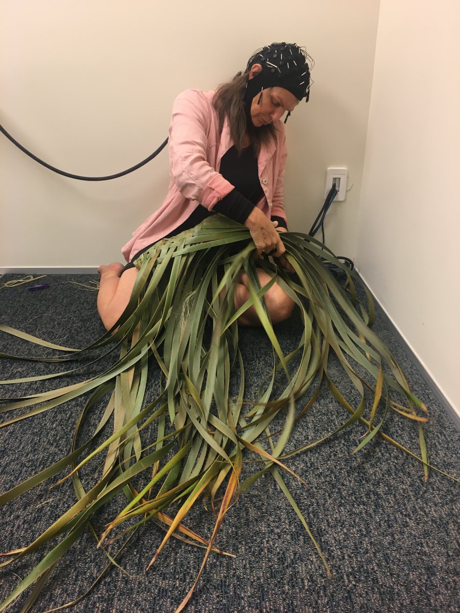 NZBrain's tweet image. Exciting #SciComm 🧠 🎨 project today, working with local artist Robyn Webster, recording her brain activity with EEG while she weaves flax. Her brainwaves will be played as audio in the exhibition space. Lovely aroma of fresh harakeke wafting from the lab…