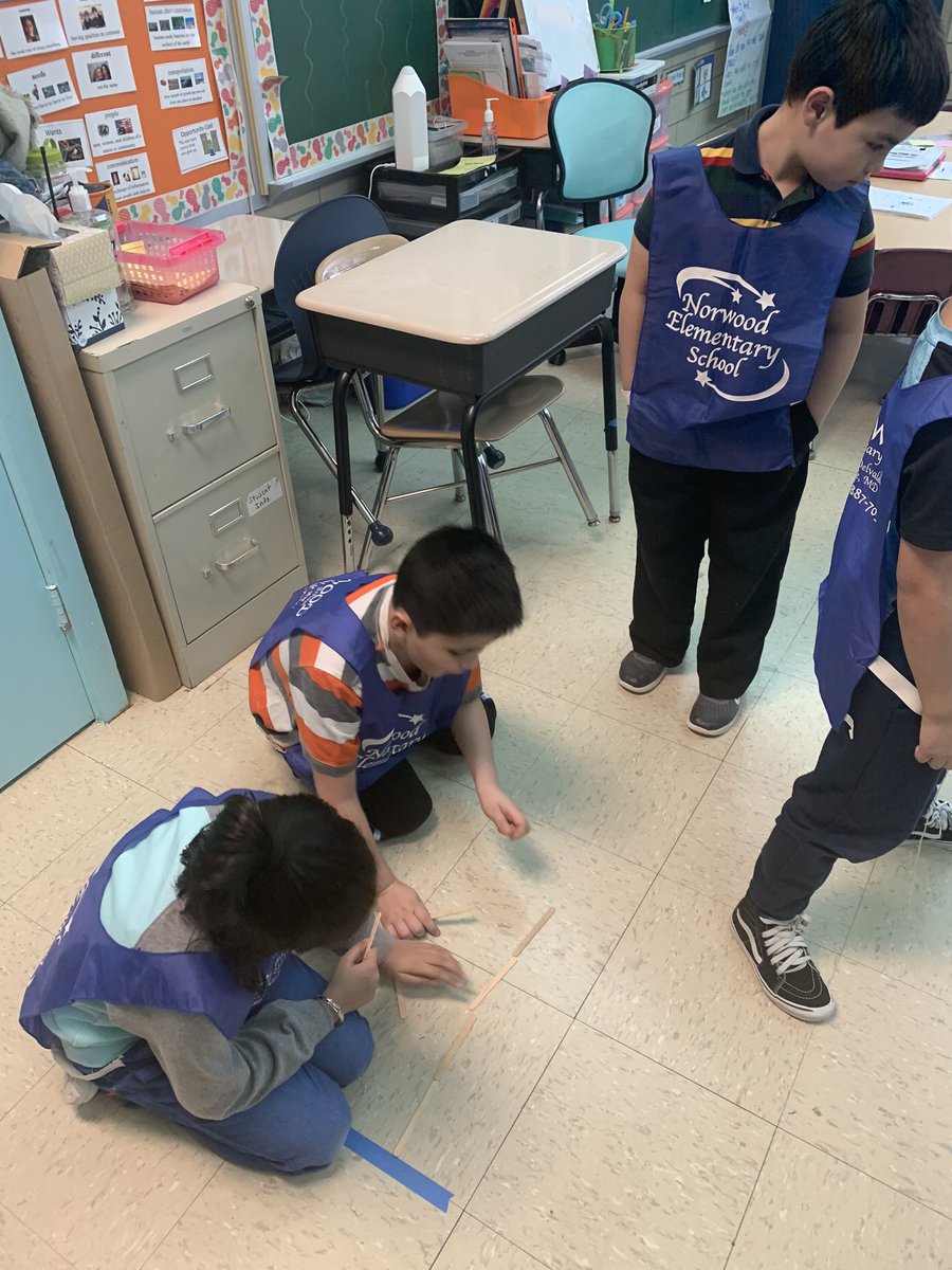 Ms_Gross_'s tweet photo. Our basketball team is ready for March Madness! We put on our jerseys and practiced measuring the distance of our jumps! 🏀 https://t.co/EY3rAhsu8z
