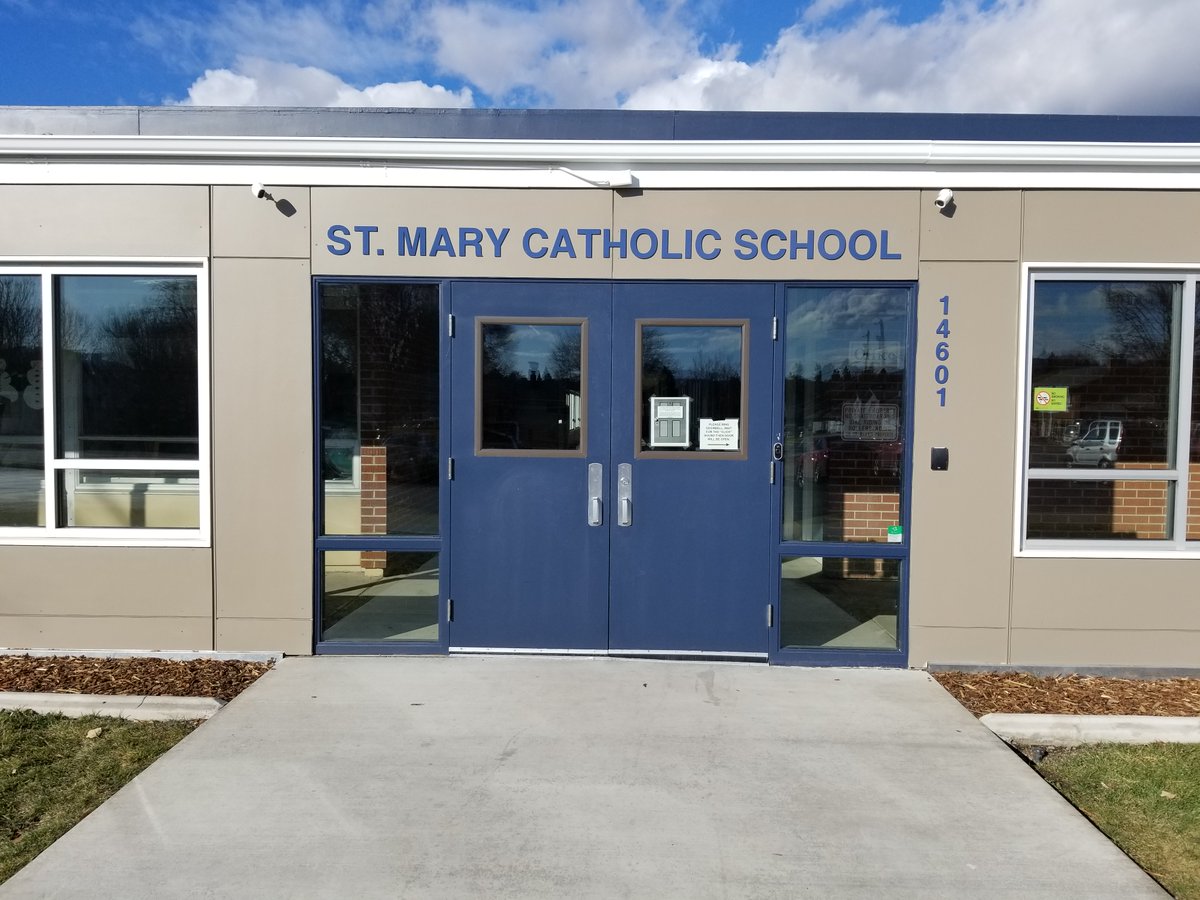 In case you haven't noticed, we had new signage put up today on the front of the school. What do you think?