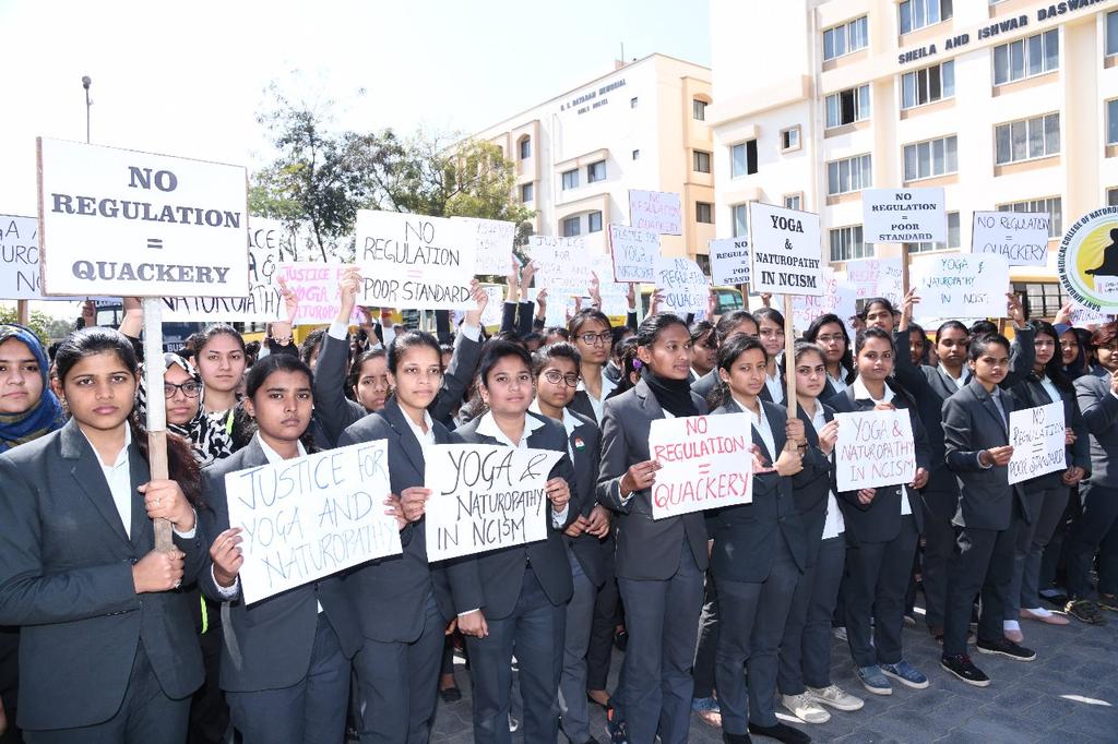 DrHemanshu1's tweet photo. Nationwide peaceful satyagraha for inclusion of #YogaandNaturopathy in #NCISM2019 in 15 states of country with approximately 10000 students and doctors from 42 colleges @narendramodi @PMOIndia @moayush @AmitShah @JPNadda @shripadynaik https://t.co/tLbeNILu8I