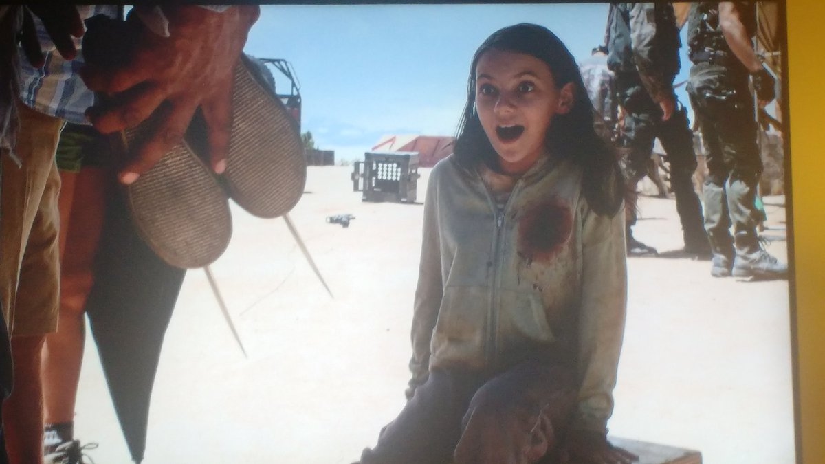 Dafne Keen's adorably ecstatic expression when first presented w/her f...