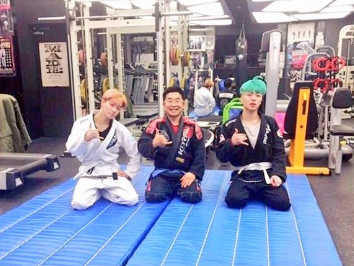 fllmoonim's tweet photo. junhoe in jiujitsu uniform through the years https://t.co/kiLmY41LRL