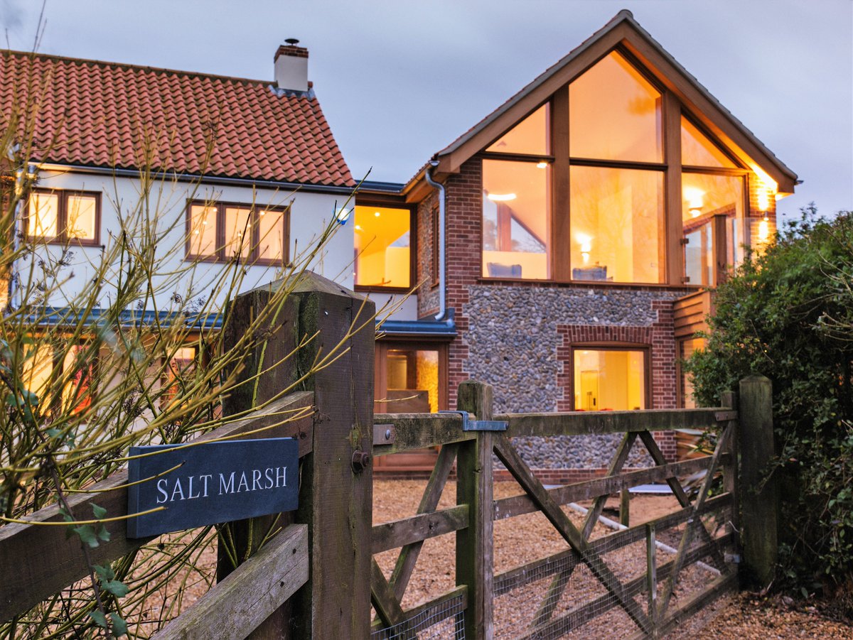 EXPAND YOUR HORIZONS Floor to ceiling windows provide stunning sea views on this award winning home. #BuildingABetterNorfolk G&M: Exceptional Norfolk Builders & Property Developers Email: info@grocottandmurfit.co.uk Phone: 01328 851420 Website: grocottandmurfit.co.uk