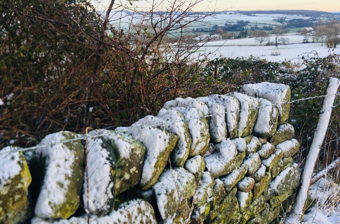 old stones with snow