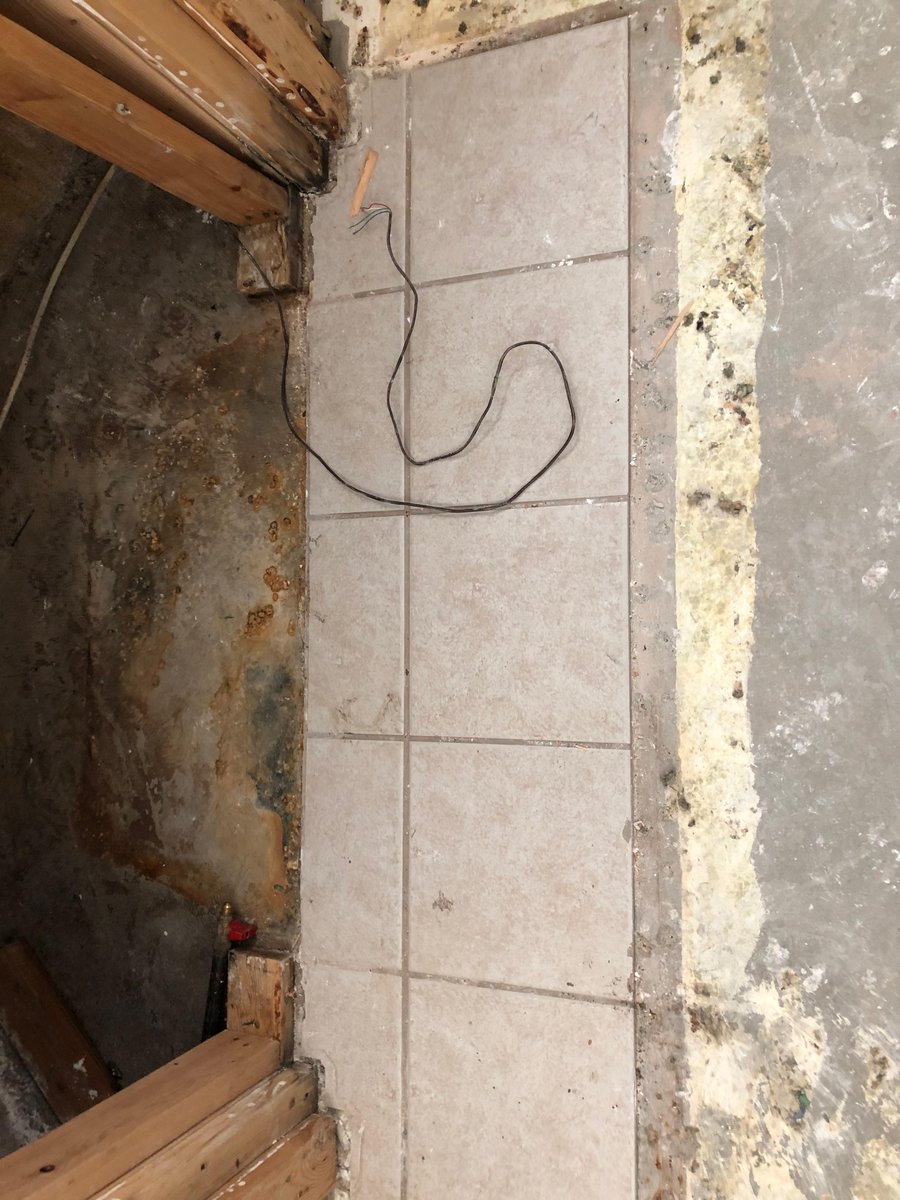 Because tile is non-porous we can clean it and not have to remove it like we did with the carpet.