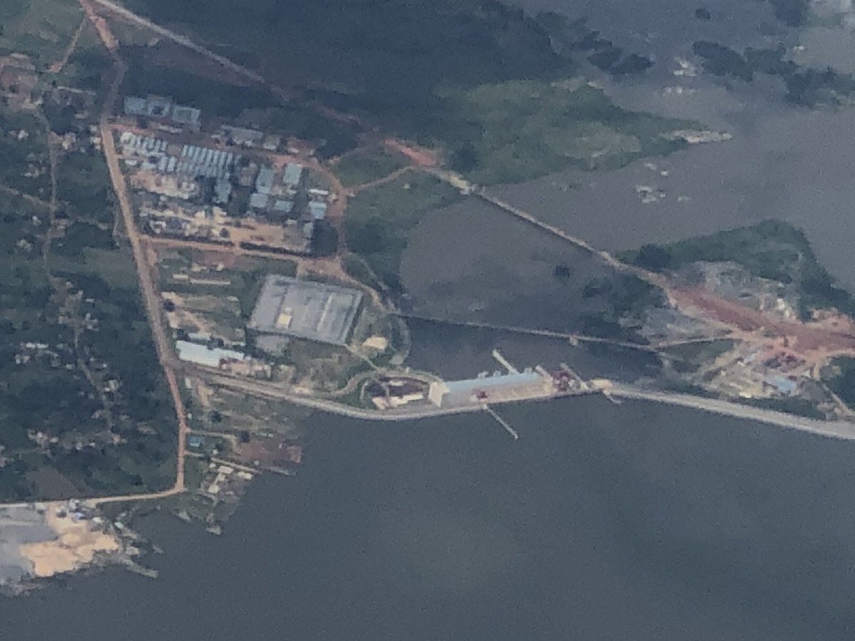 kasyate's tweet image. The magnificent #Isimba hydropower station as seen from close to 15,000 feet. In the hind-ground is the once taunted as non-existent Kayunga-Kamuli bridge works now at 35% physical progress. Dam has been generating power since Dec. 2018. The bridge shld be completed by end year!