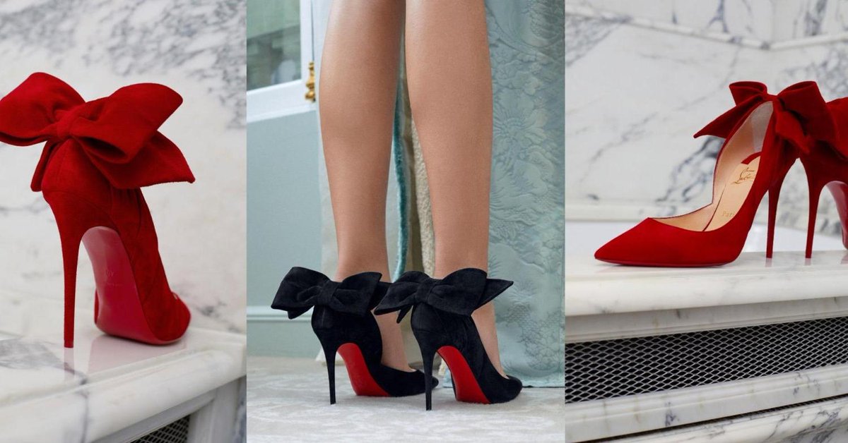 pair of red bottom shoes