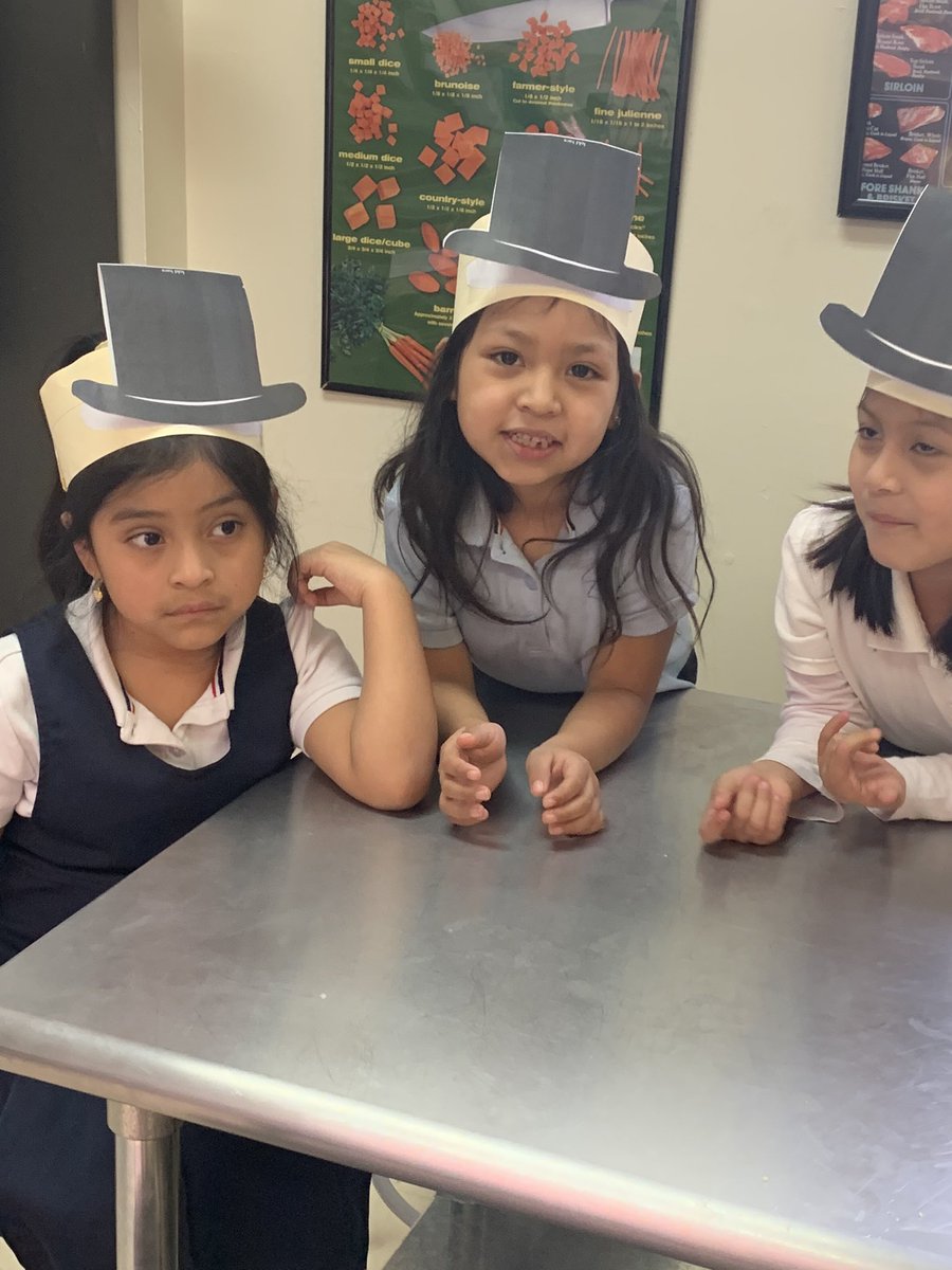 Our kindergarteners are baking sugar cookies in Culinary class with Chef Torres. They created their informational Abraham Lincoln hats with their teacher Ms. Guerra. <a href="/NewcomersOrange/">Newcomers' Academy</a> #goodtogreat
