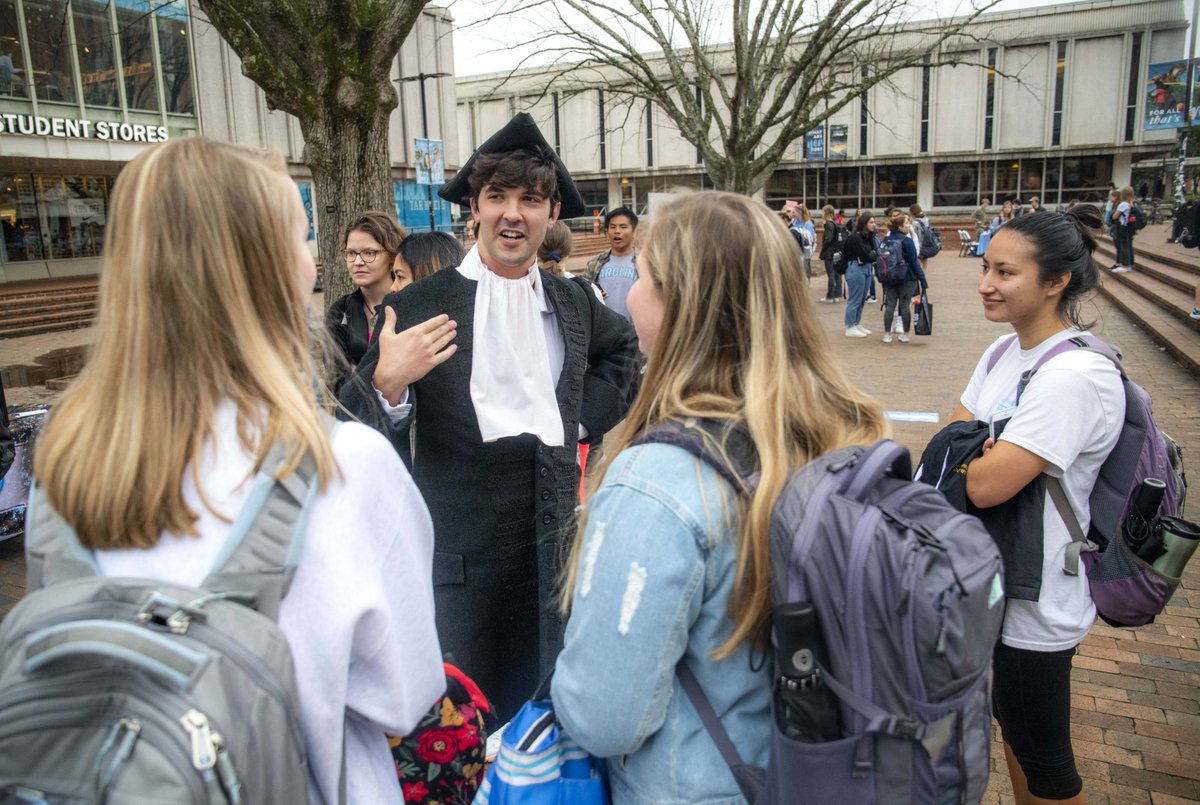 UNC's tweet photo. On this day in 1795, Carolina's first student arrived in Chapel Hill after a long walk from Wilmington. @OBTambassadors celebrated Hinton James today with fun activities (and food!) across campus, including some photos in the Pit with the man himself 😉🐏 #UNC https://t.co/zoei0GK1dW