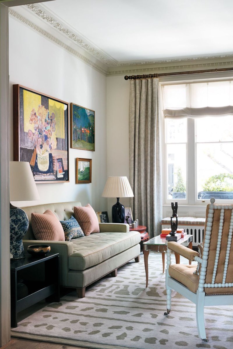_houseandgarden's tweet photo. White walls don't have to be stark - these living rooms from our inspiration gallery pile on the colour in fabrics and artwork. https://t.co/OlLvR4kpVN https://t.co/3CunupG6ME