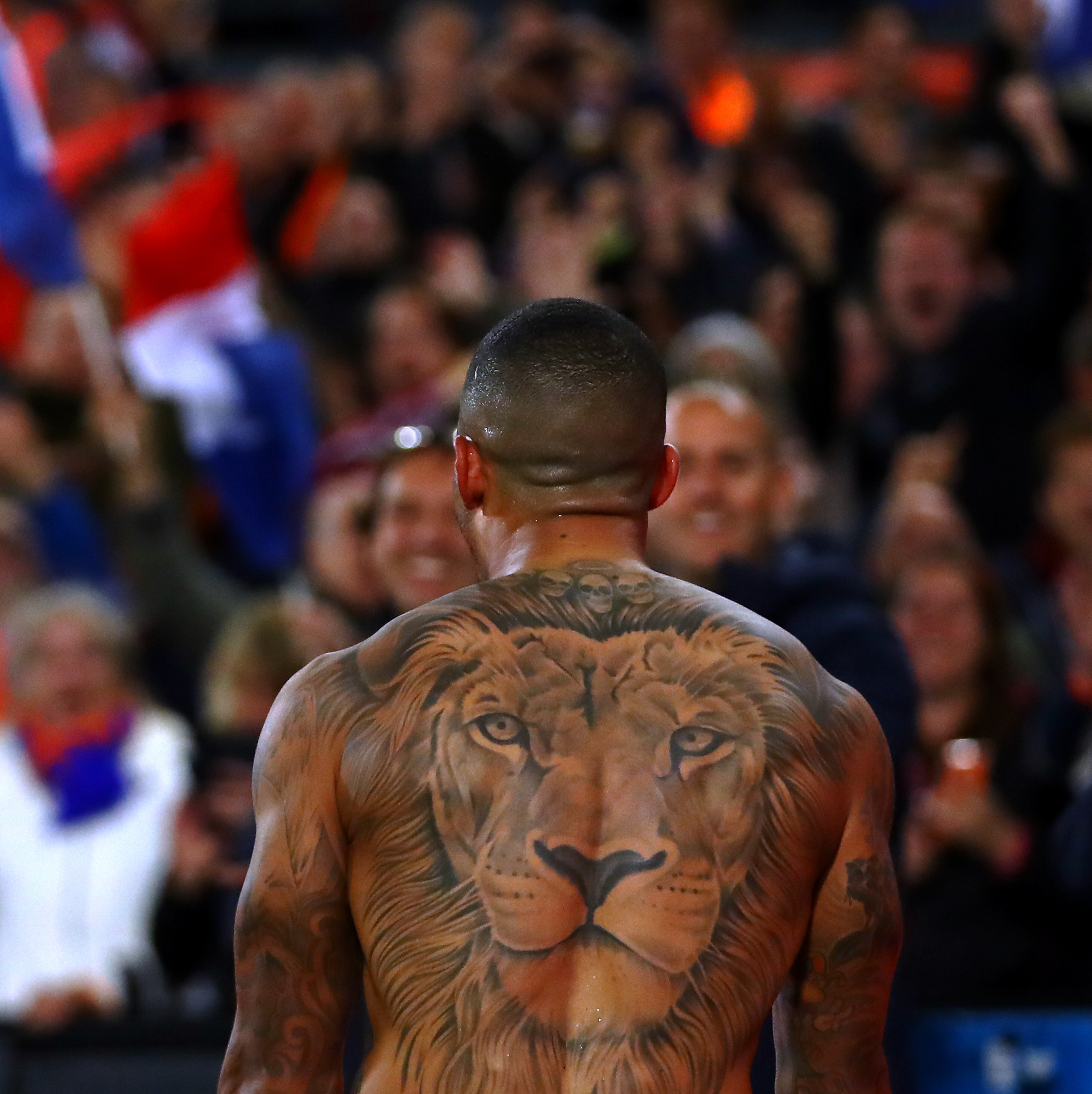 Why does Memphis Depay have a lion tattoo on his back? Netherlands