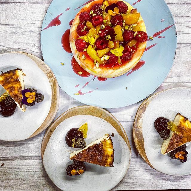 2 very different cheesecakes. The whole cake is a traditional New York cheesecake with hobnobs biscuit base covered in a raspberry and elderflower syrup, poached peaches and fresh raspberries. The plated one is a Basque cheesecake, a simple cheesecake m… ift.tt/2OR2MYz