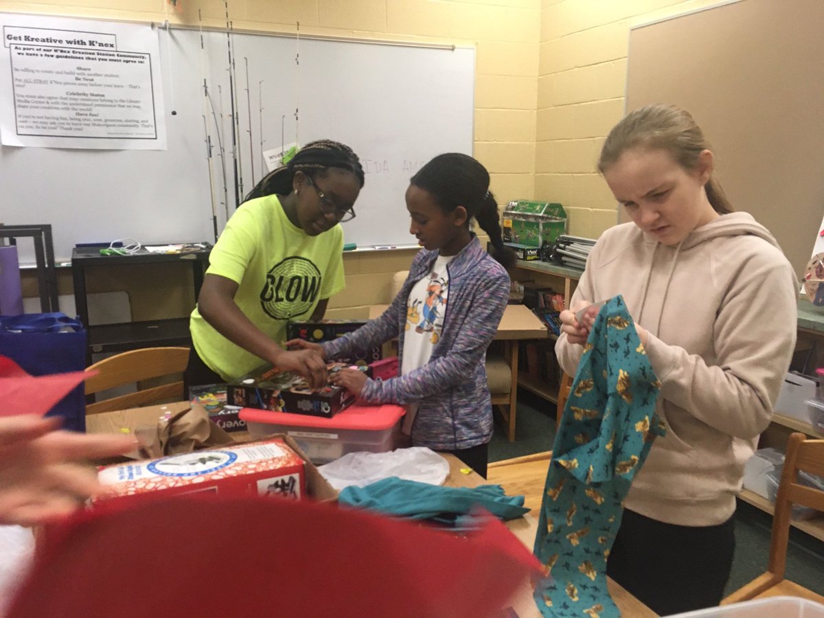 CMSLibraryHCPSS's tweet photo. Great job, Girl Up seminar members! This week they wrapped pajamas and toys for pediatric patients at Howard County General Hospital. https://t.co/YjjS7Vi2jb