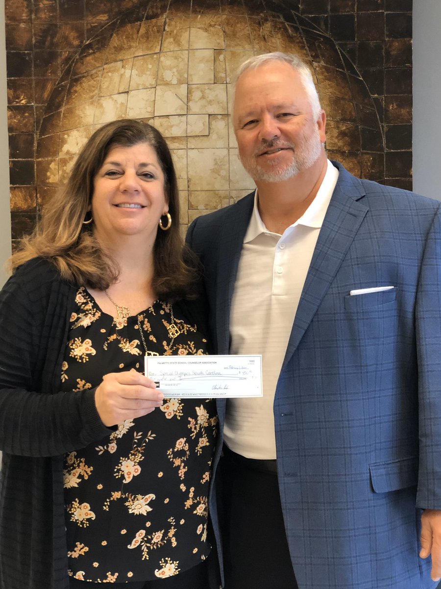 PSSCA_Counselor's tweet image. #tbt to #PSSCA2021 Pres Leigh Eubanks presenting a check to Barry Coats from South Carolina Special Olympics #PSSCACares