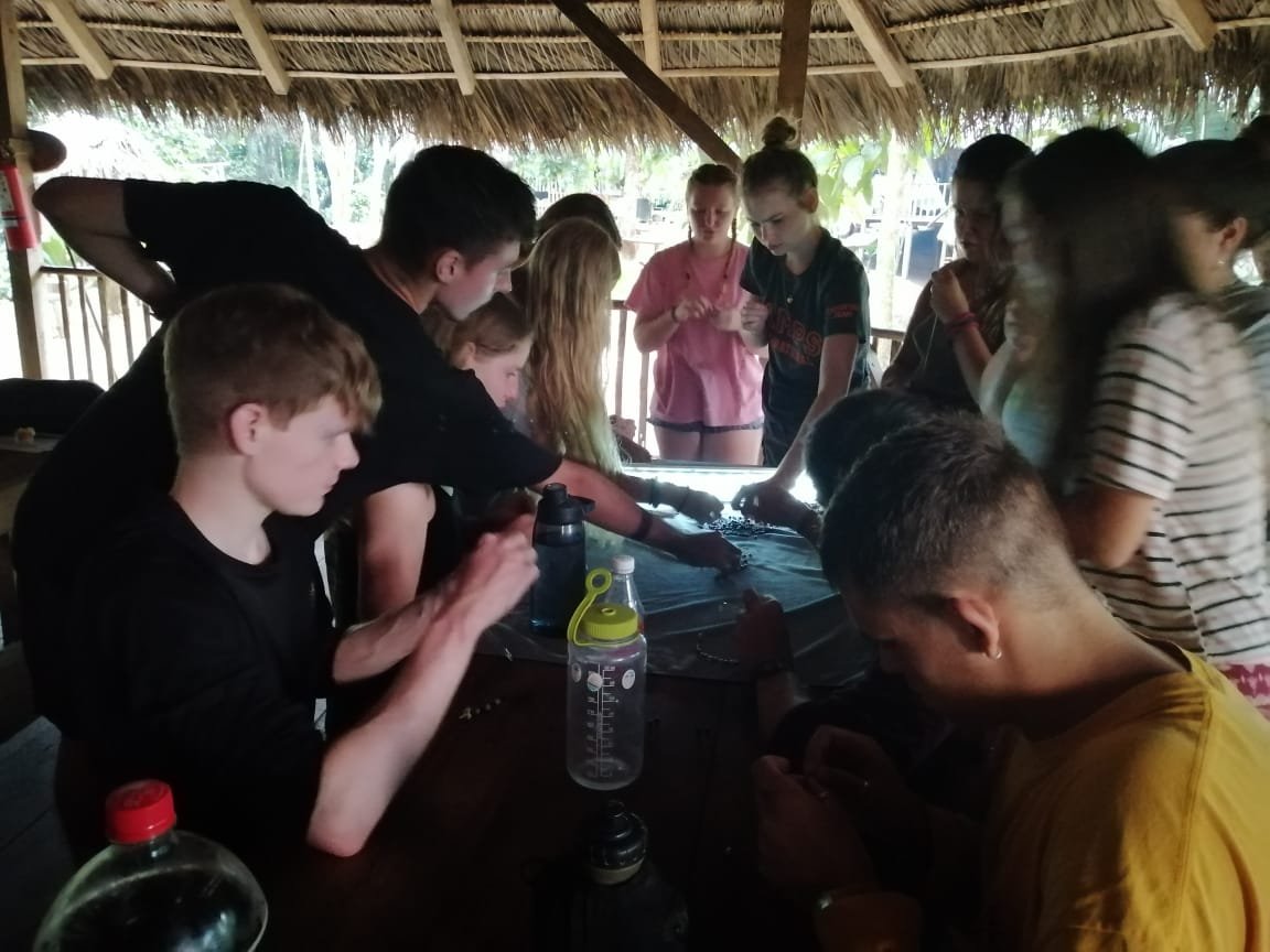 CampEcuador's tweet photo. #GapYear #Volunteers at #CampChilliUrku learning the art of doing bracelets jungle style, sharing with the locals and learning about different cultures is part of the experience #DoSomethingAmazing #CamspEffect @CampsInt https://t.co/w1Mogsp34k