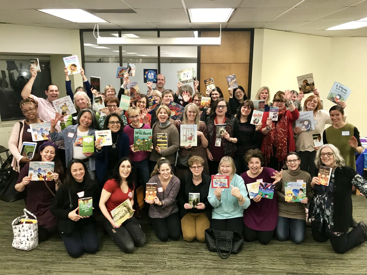 Our members celebrating @ireadcanadian at last night's monthly meeting! Such a happy crowd! Zoom in to get some awesome Canadian #kidlit recommendations to read on February 19th! #IReadCanadian #IReadCanadianDay #canadiankidlit