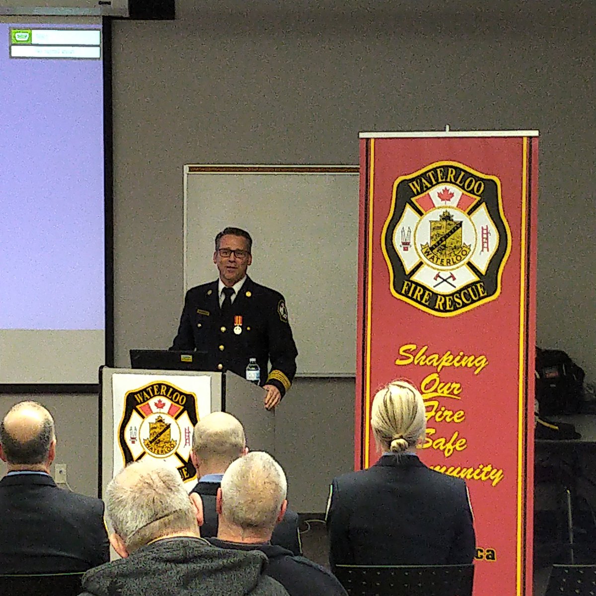 Waterloo_Fire's tweet photo. Opening remarks from our Fire Chief @richardhepditch at the Firefighter Recruit Grad Ceremony #Wehirethebest #Goalsetting #Tolead #Leadershipbeyongthechainofcommand #Service #Dignity #Caring @rschube04 @adairm1 @WPFFA791 https://t.co/pDzghzMPUO