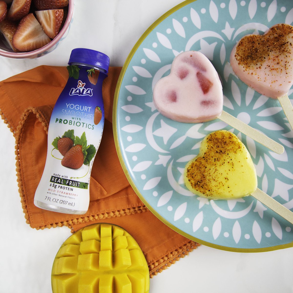 Let your heart do the talking. What better way to say te amo than with a LALA Yogurt Smoothie Pop? Click the link in our bio for our recipe! 🥰 #ValentinesDay2020 #Mango #Strawberry #Yogurt #HealthyChoices