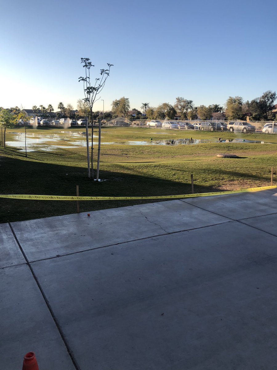 StandifirdRyan's tweet photo. Golf courses get a bad rap for water usage. After 1/2 inch of rain and ponds on the grass the schools are still watering.  How pathetic https://t.co/qcptLtdeyQ