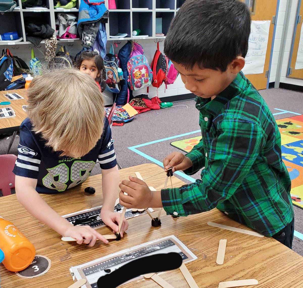 SC_Bowman's tweet image. Loved getting to help with the bridge building STEM Challenge with @MissKuzas! #tinyengineers #WeAreSwans @SwansCreekES