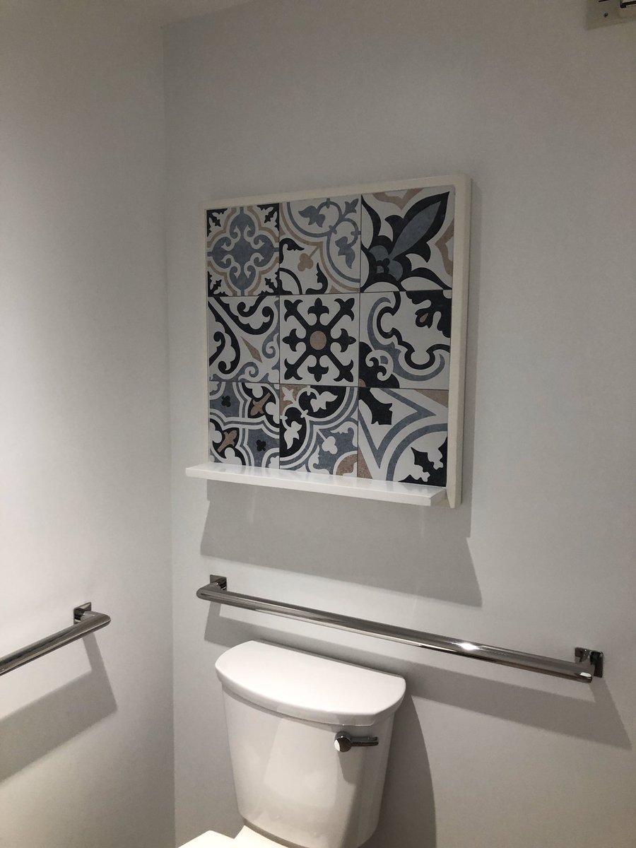 StylisticT's tweet photo. @HiltonHotels really!?Slapping tiles you can find at the local hardware store on a board and calling it “decore”is just lazy and cheap and does not fit with the aesthetics of the image your trying to present to your target market. Contact https://t.co/p4bwz49tJq so we can help. https://t.co/iHsW5Cx7NS