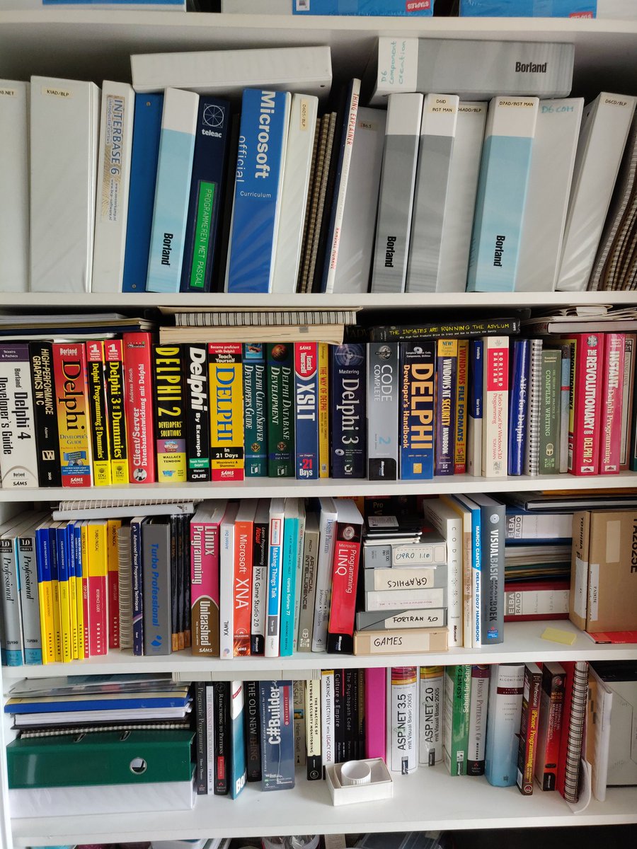 jpluimers's tweet image. Parts of the book and course collection. Note the main shelves are 3 books deep. #delphi25