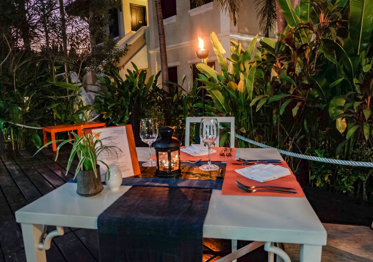 villamaly's tweet photo. A romantic dinner is the star of #ValentinesDay. We're setting poolside candlelit tables under a canopy of coconut leaves to woo all lovebirds this evening. Care to join? https://t.co/gIQVIQuanV #valentinesdinner #luangprabang https://t.co/0gIrpRN610