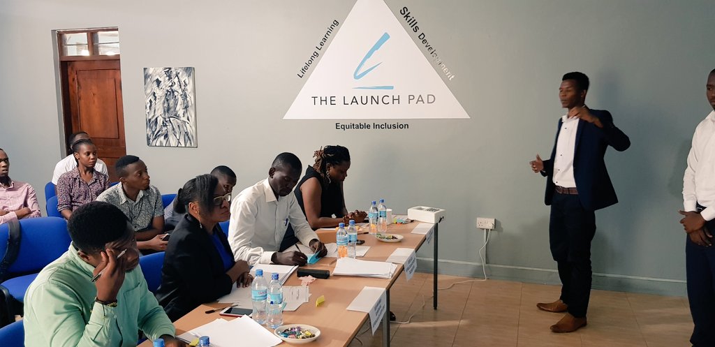 TheLaunchPadTZ's tweet photo. Emanuel Tlemu of Digital Suggestion Box (digitally captures pupil views on Academic, Sanitation, Hygiene etc) delivering his pitch as part of our @injiniedtech powered Sprint Week at the Launchpad 
#HappeningNow 
The box(pictured) is fully designed and manufactured in TANZANIA! https://t.co/uJmQwenS87