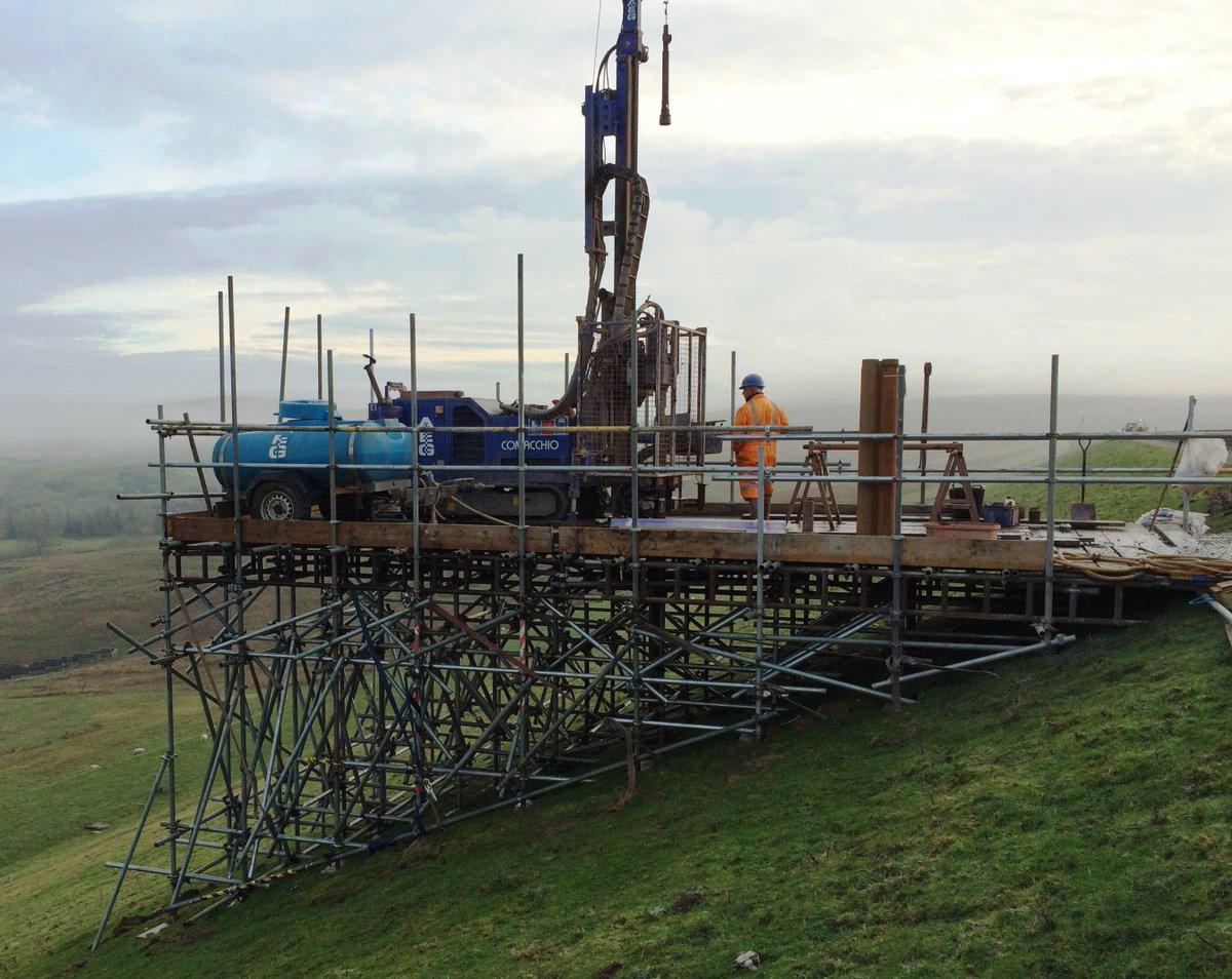 AEG #drilling on an #embankment in County Durham. Due to the extent of the slope gradient we needed to use #scaffolding to secure a platform for the #rig to allow us to #drill in the required location and to reach the target depth.  If you have similar requirements contact us.