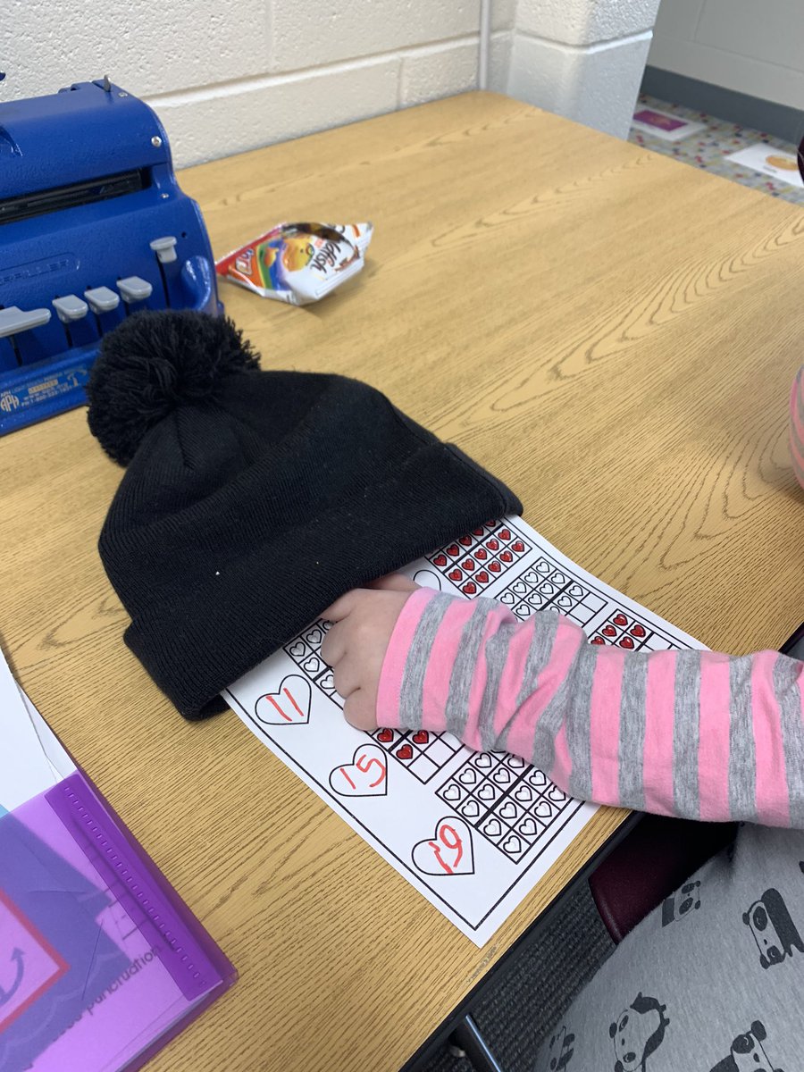 AmyYohoTVI's tweet photo. When you’re working on tactile skills with a dual media student who likes to use her vision to peek at the tactile dots on a cold winter day you get creative. ❤️🥶 TN: Braille dots worksheet hidden inside of a winter hat. #braille #TeacherOfTheVisuallyImpaired #MakeBrailleFun https://t.co/ldkY39fYB2