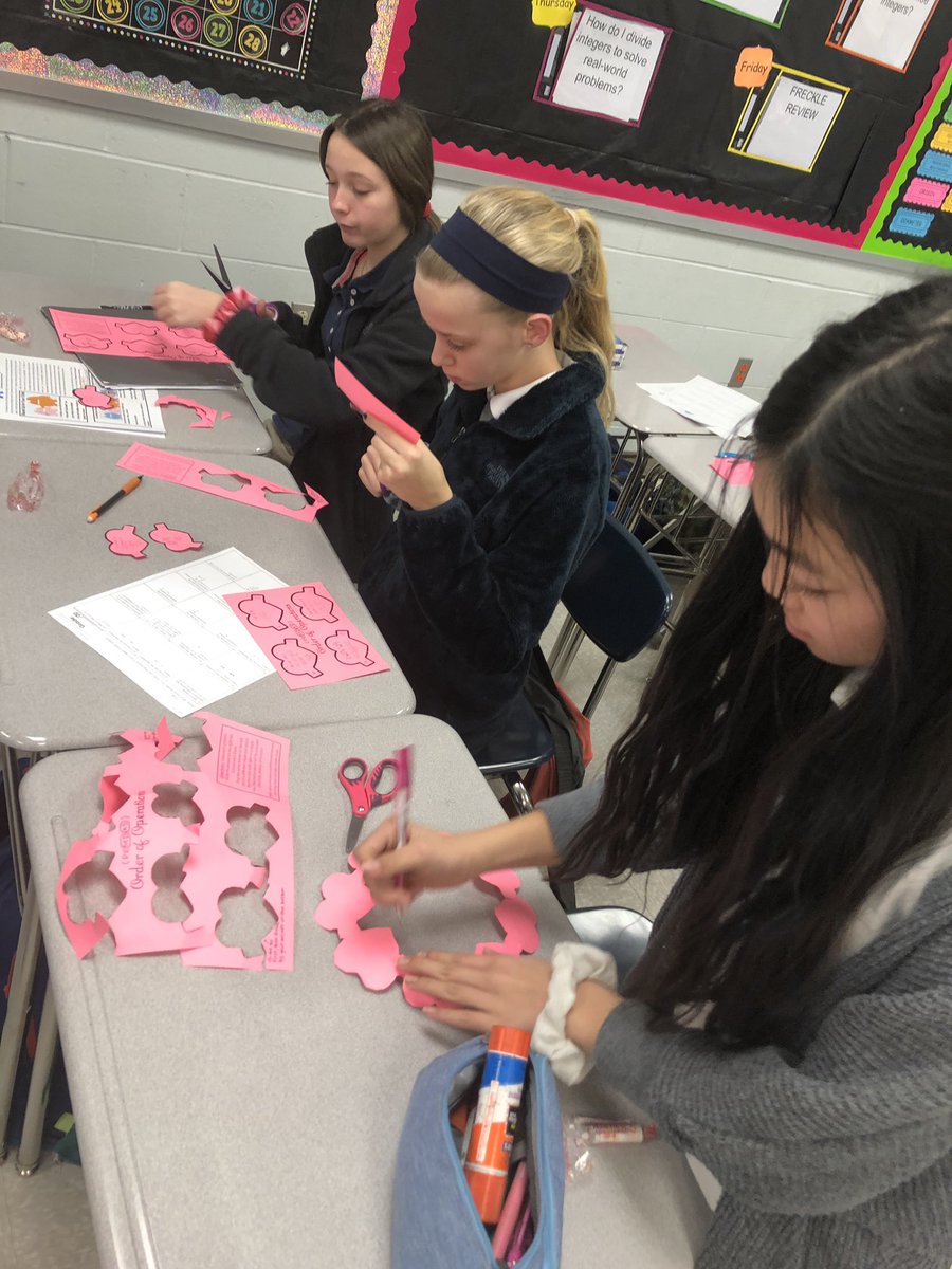 MrsJuris's tweet photo. Valentine’s Day and math review! 7th grade blue group is reviewing for their upcoming integers test by making Valentine’s Day review wreaths! https://t.co/pqAsCcwhV3