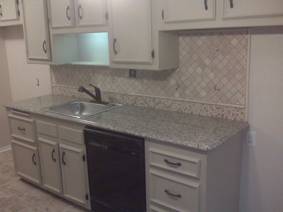 ballbuilders's tweet image. Kitchen rebuild project use the original cabinets. The cabinets were cleaned, primed and painted. The countertop was replaced with granite. The kitchen was repainted and new tile floor was installed. The drawer and door holes were filled and sanded flush. Custom backsplash.
