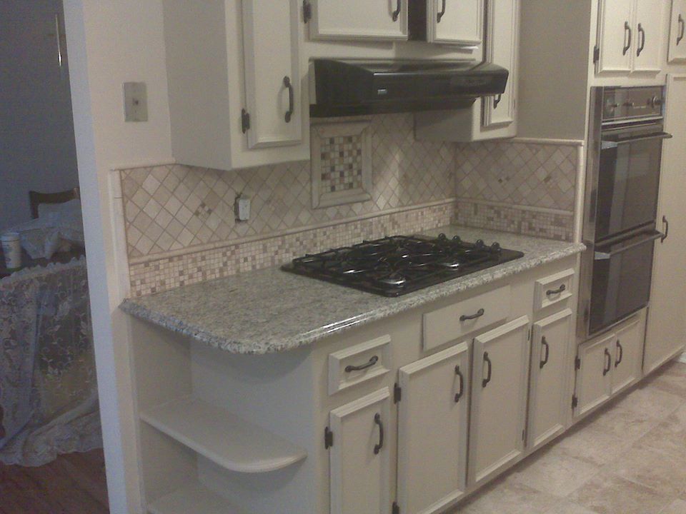 ballbuilders's tweet image. Kitchen rebuild project use the original cabinets. The cabinets were cleaned, primed and painted. The countertop was replaced with granite. The kitchen was repainted and new tile floor was installed. The drawer and door holes were filled and sanded flush. Custom backsplash.