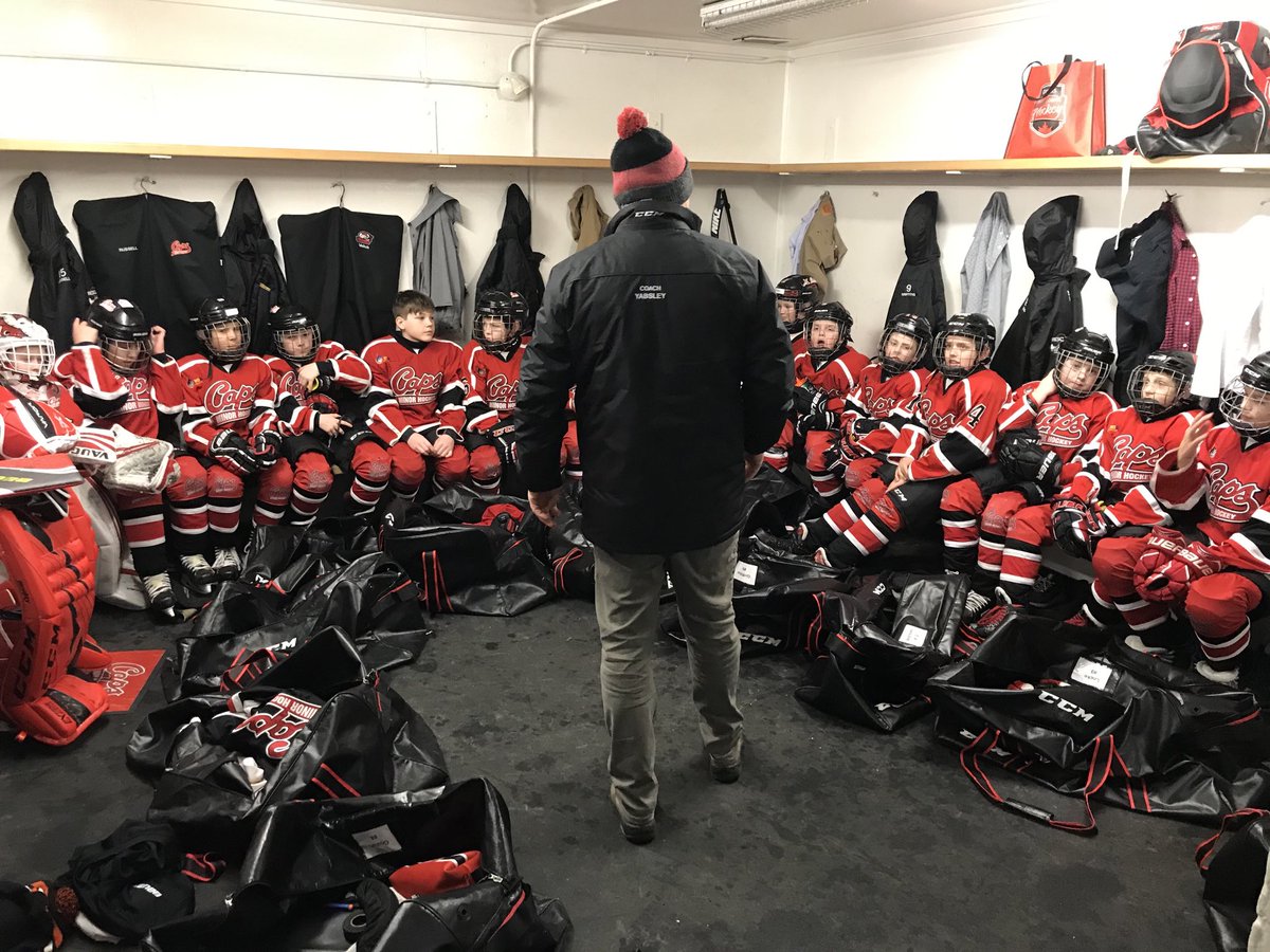 CapsAtomA's tweet image. Coach going over the game plan for tonight. #gocaps