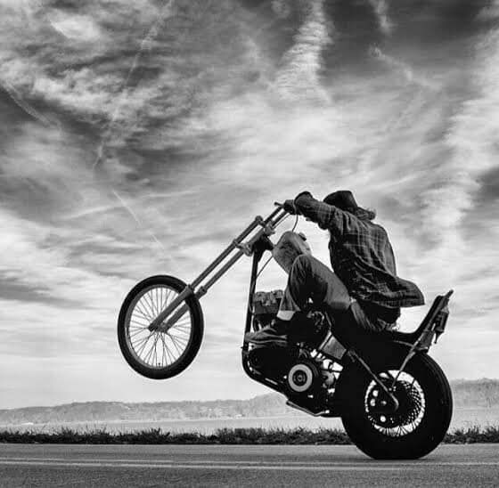psyneways's tweet photo. In the words of Dennis Miller, "I am outta here..." #FridayVibes #FridayFeeling #chopper #wheelie #harleydavidson #letsroll #throttleout #FridayNight #blackandwhitephoto #psyne https://t.co/SWgNtRfKE3