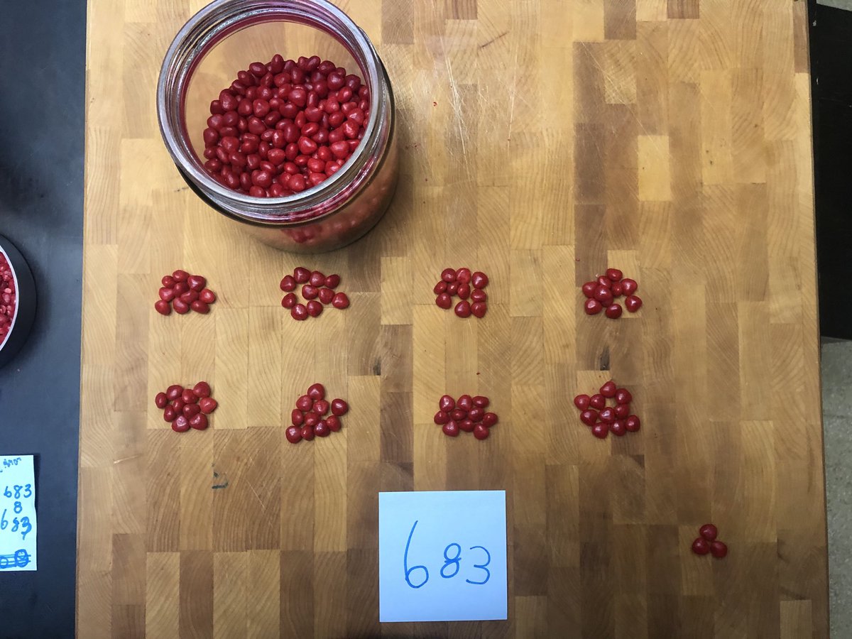csnider04's tweet photo. Our own Valentine's Day #3actmathtask was super fun! How many cinnamon hearts are in the jar? @JGSimcoeGr3_4B students made many connections to multiplication and looking for "groups of 70" after the act 2 pics were revealed. Our highest answer was 580 for the win! #math https://t.co/Fue6s8CXbL