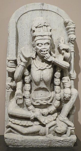 This 1200 year old Pratihara era Chamunda is now smuggled away at the norton simon museum in the US. She holds a khagga(sword), krpana(dagger), panapatra(vessel),damaru,a munda(severed head),khatvanga. She's wearing a mundamala & seated on top of a preta.  https://www.nortonsimon.org/art/detail/F.1978.07.S