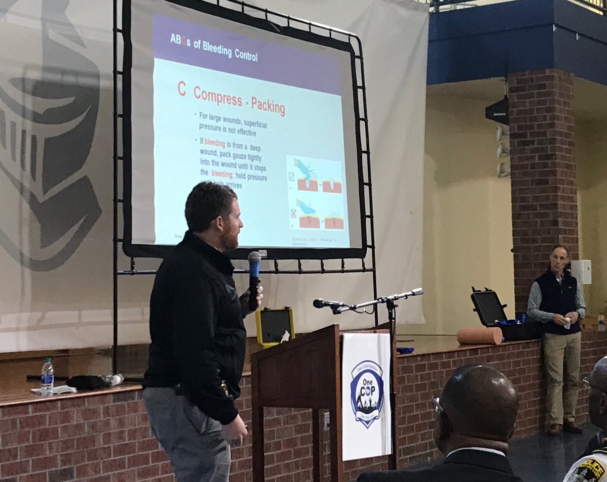 NationalSheriff's tweet photo. Capt. Adam Fouche of the @universityofga Police tells faith leaders the importance of packing wounds and stopping bleeding - most wounds are deep, not surface..."this is what makes people most squeamish" but it's important. #SupportingBlue #STBAthens https://t.co/0c5pprdBIl