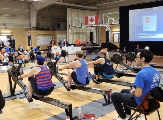 katpowell's tweet photo. Did a 2K erg race today! Stoked that I finished and didn’t have a heart attack! Haha! That’s me in the stripes just getting ready to start the race. #ididntcomelast #winterrowing https://t.co/sjB6rpVFDc