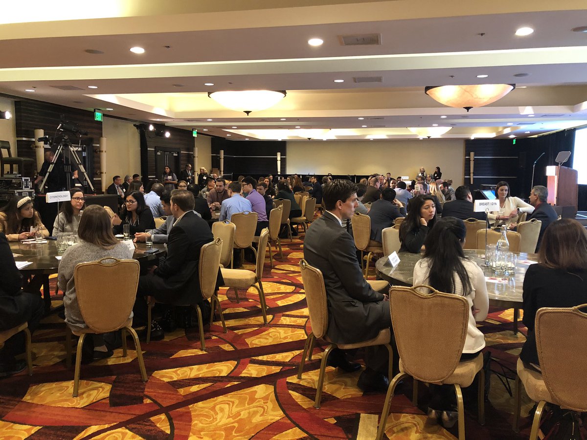 ALBoothMD's tweet photo. Residents spread out by subspecialty interests discussing how they can get their preferred fellowship, research collaboration across institutions, and networking #caprf2020 https://t.co/URW7aWwABG