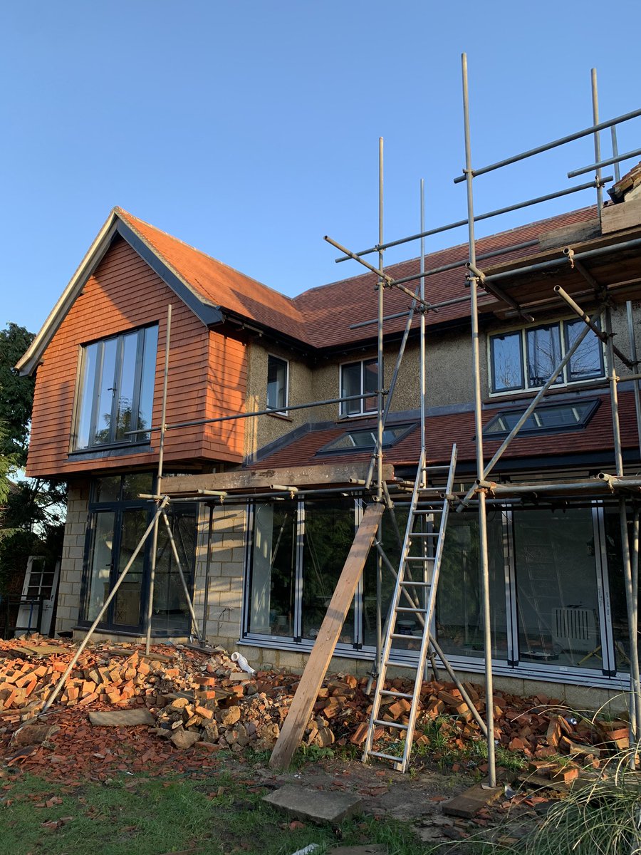 CraigSt94398971's tweet photo. Recent double story extension in Dorking using clay roof tiles to the pitched roof slopes and vertical tile hanging. #tiling #Dorking #roofing https://t.co/zKAMsuW09C