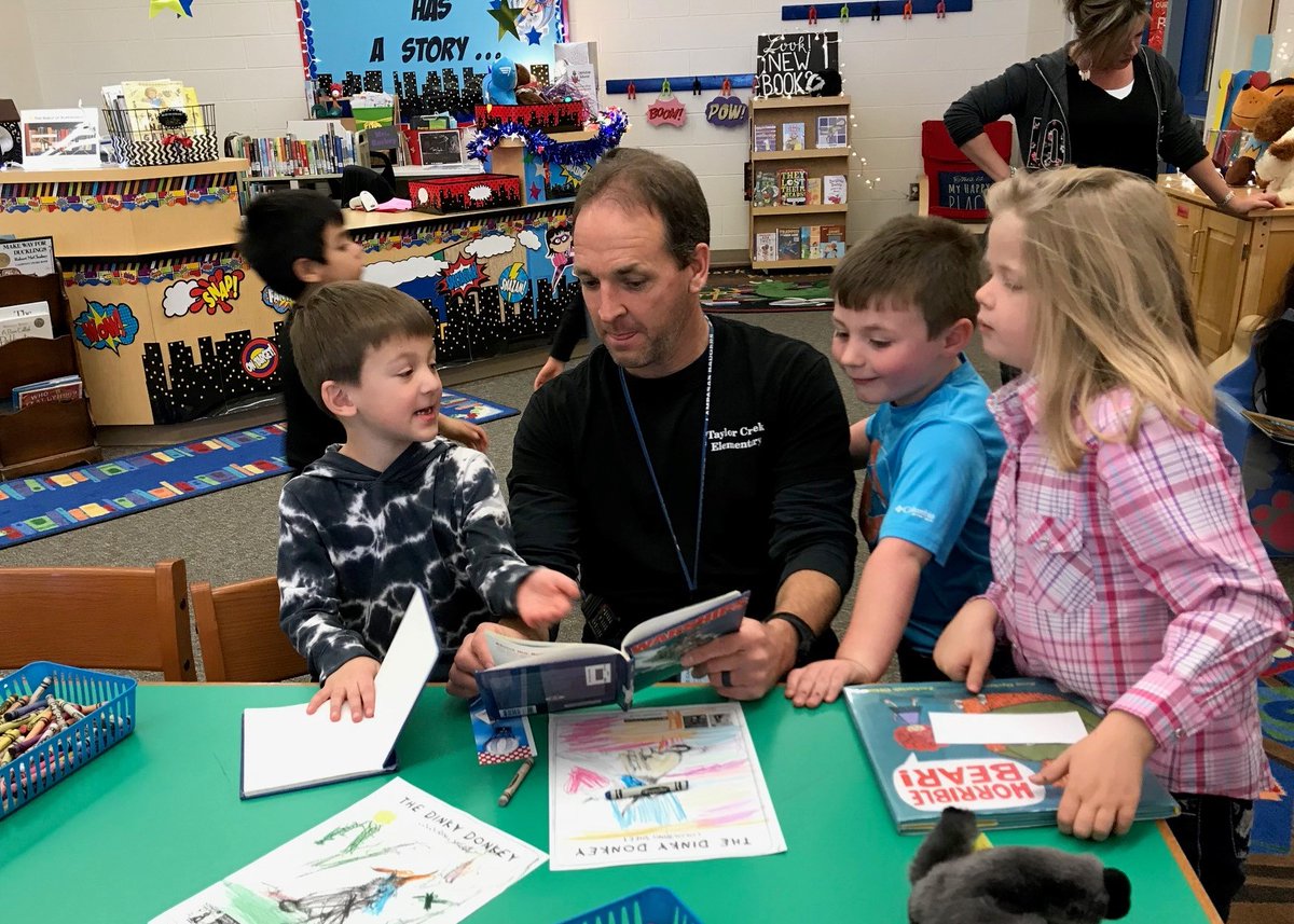 Team reading in the library with some awesome kids!
<a href="/lampasastce/">Taylor Creek Elementary</a>  #thinkbiglisd  #thinkbigtce