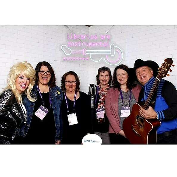 MarshallCPL's tweet photo. MCPL librarians working 9-5 at PLA this week in Nashville. #PLA2020 #dollyandgarthphotobooth #librariesareinstrumental #librarianstakenashville https://t.co/Me8c9X0PSq https://t.co/xErgUh9l6X