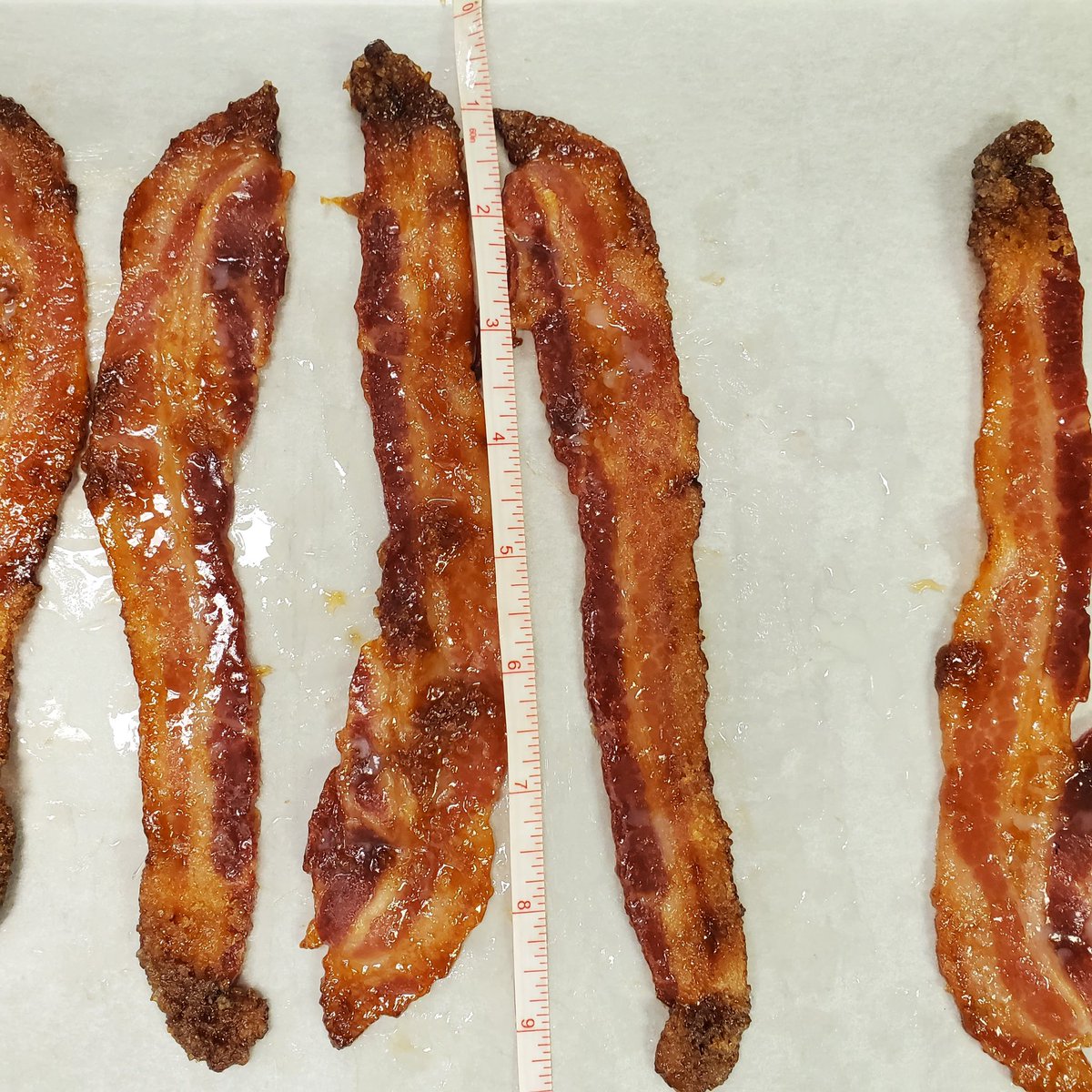 Measuring the bacon.  It’s a long story.   Will tell more on the spring menu.